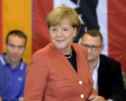 Almaniyada parlament seçkilərinin ilkin nəticələri açıqlanıb
