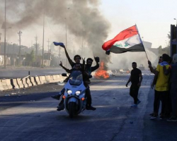 İraqda etirazçılar diplomatik nümayəndəliyin binasını yandırdılar